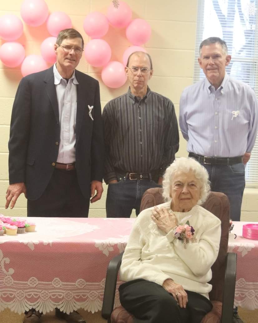 (Left to right) Goodell’s sons Jay, Bruce, and Keith with Virginia at her party in December.