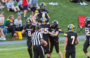 Garfield G-Men football blows past Brookfield, caps undefeated season The G-Men celebrate in the endzone following sophomore Brandyn Bogucki’s 60yd touchdown against Campbell Memorial. Photo: Benjamin Coll/Garfield Schools