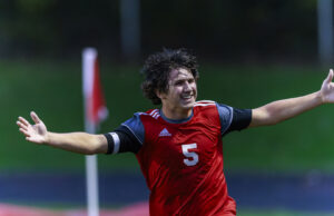 Red Devils Soccer Finishes Off Bristol, Defends Sectional Banner Crestwood #5, Elijah Jurisch celebrates after he scored