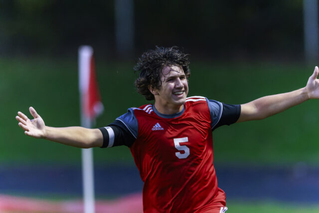Red Devils Soccer Finishes Off Bristol, Defends Sectional Banner Crestwood #5, Elijah Jurisch celebrates after he scored