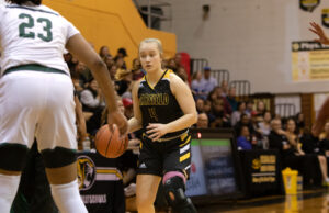 Garfield G-Men girls basketball returns younger but still aim to keep tradition Zoey May faces off against Laurel School’s defense at last year’s playoff game in Cuyahoga Falls/Ben Coll