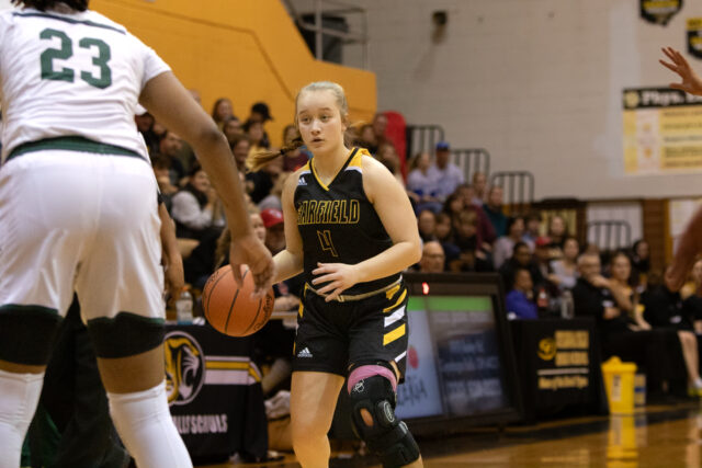 Zoey May faces off against Laurel School’s defense at last year’s playoff game in Cuyahoga Falls/Ben Coll