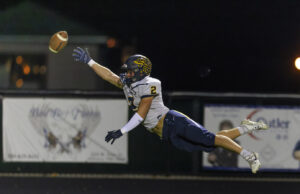 Rockets football can’t overcome West Branch in regional quarterfinal matchup Streetsboro #2, Preston Hopperton attempts a diving catch