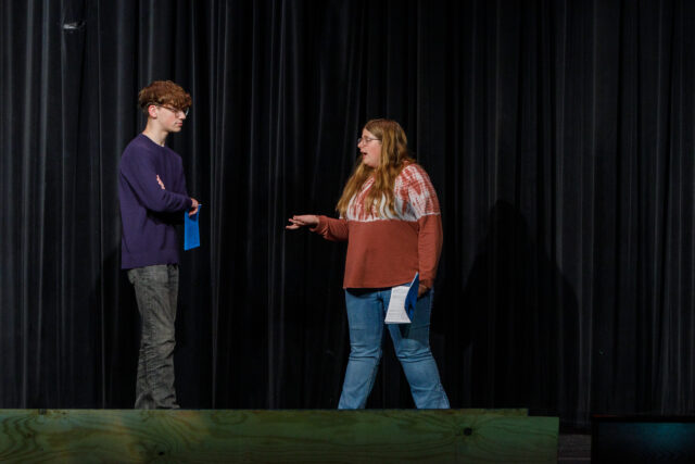 Caleb Canan and Emma Scherick rehearse a scene from Adventure