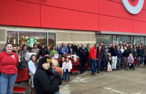 Shop with A Cop program brings cheer to local kids for a dozen years Group Photo