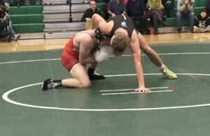 Aurora wrestling sweeps tri-meet against Chardon and Mayfield The Aurora Greenmen wrestling team competes in a tri-match against Chardon and Mayfield/Photo by Daniel Sherriff