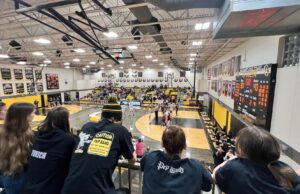 Garfield G-Men basketball cools off after hot start, loses against Waterloo The student-run “GG Brass Machine” pep band watches anxiously as Preston Gedeon heads to the line for three fouls shots to tie the game/Photo by Ben Coll