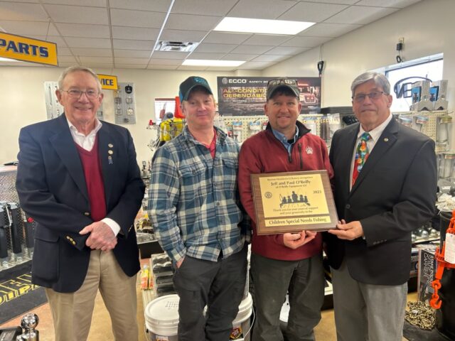 BMR past District Governor, Bob Johnson; Paul and Jeff O'Reilly, co-owners O'Reilly Equipment and Geauga County Commissioner Jim Dvorak. / Geauga County Maple Leaf