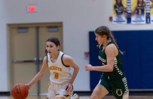 Rocket girls basketball tames Colts in conference showdown Photo by Tim Howard