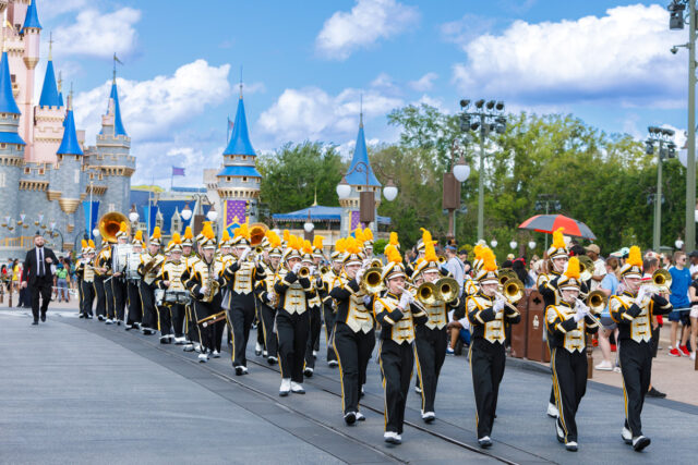 The Marching Pride parades through the center of the Magic Kingdom ahead of the mid-day parade on Saturday, March 23rd. Photo: Ben Coll