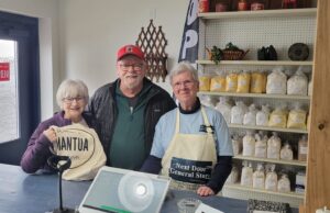 Local Family Business Opens Next Door General Store Next Door General Store’s first customers Paula and Toomas Tubalkain with Terri Vechery