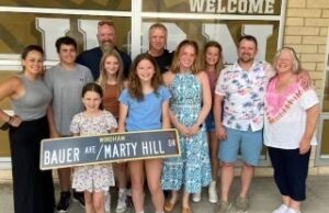 Windham honors longtime basketball CoachMarty Hill by naming street in his honor