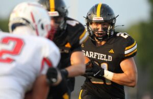 Garfield G-Men football starts season strong by conquering Warriors