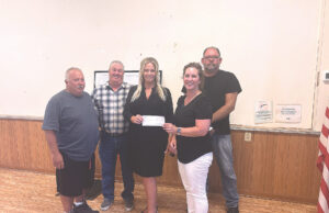 Windham Township Board of Trustees receive donation towards Portage Foundation Disaster Relief Fund