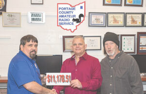 Radio club donates over $11,000 to Center of Hope