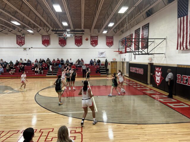 Red Devil girls’ basketball stumbles late in season-opening loss against Wildcats Crestwood junior guard Maddie Grace Gonczy attempts a mid-range jump shot/Photo by Daniel Sherriff