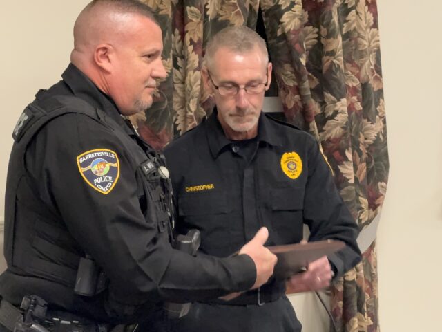 Police Chief Tim Christopher issues one of two formal commendations