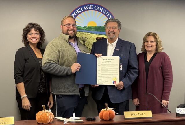 Pictured left to right are: Portage County Commissioner Sabrina Christian-Bennett, board of commissioners vice president; Portage County Emergency Management Agency Director Ryan Shackelford; Commissioner Mike Tinlin, board of commissioners president; and Commissioner Jill Crawford.