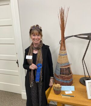 Middlefield Artist Annie Peters and award-winning Basket for Your Thoughts/Photo courtesy of Annie Meyer