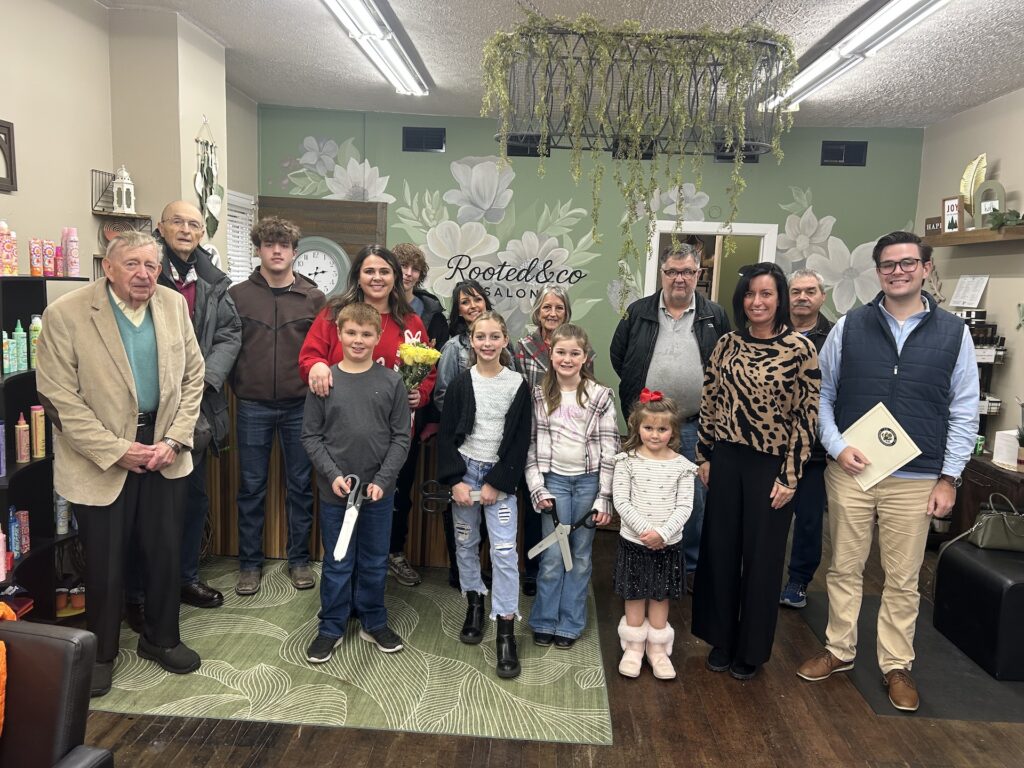 The Ravenna community gathers to celebrate the ribbon-cutting ceremony of Rooted & Co Salon/Photo by Daniel Sherriff