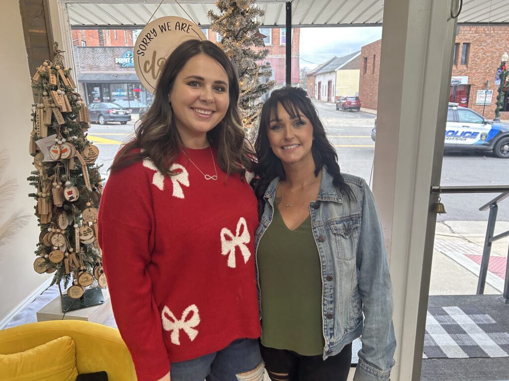 Morgan Taylor (left) and Sara Davis (right) stand together in their new hair salon/Photo by Daniel Sherriff