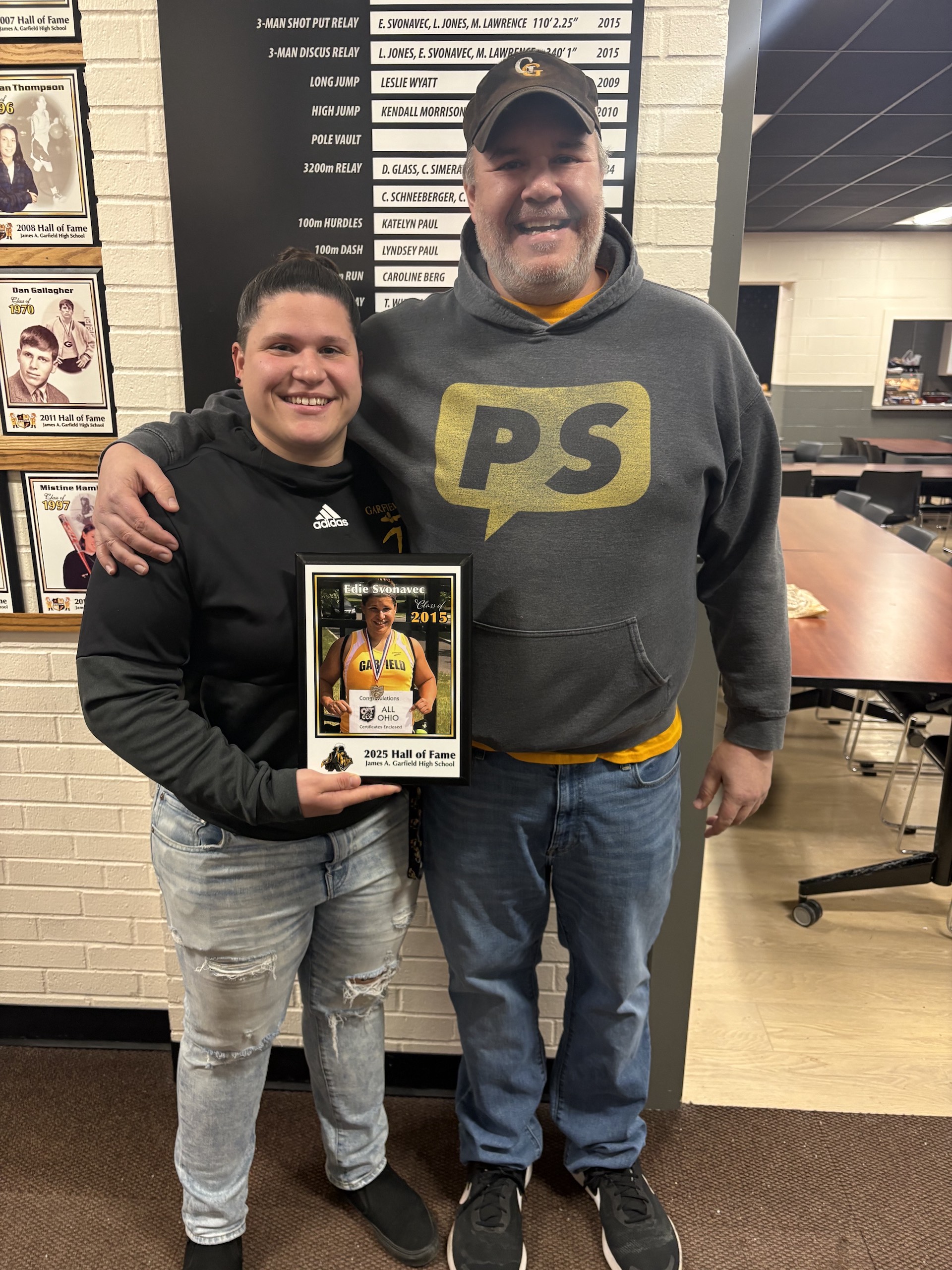 Garfield state champion thrower Edie Svonavec inducted in Hall of Fame Edie Svonavec (left) and Garfield Athletic Director/Track Coach Jim Pfleger (right)