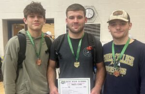 Berkshire’s Danny Tiller wraps up D-III district title Berkshire senior Danny Tiller (center) earned his first career district title at 190 pounds at the Ohio High School Athletic Association Division III Independence district tournament last weekend/Photo courtesy of Coach Dave Malkus