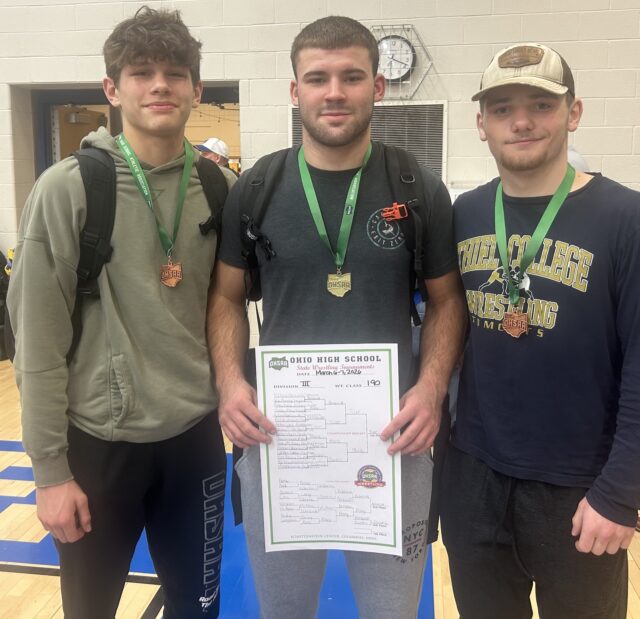 Berkshire senior Danny Tiller (center) earned his first career district title at 190 pounds at the Ohio High School Athletic Association Division III Independence district tournament last weekend/Photo courtesy of Coach Dave Malkus