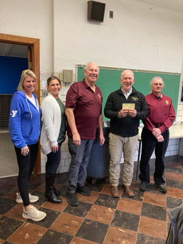 Garrettsville Knights of Columbus makes donation to Nelson Garrettsville Community Cupboard Pictured left to right NGCC Board members Kim Curry, Danielle Hoislbauer, DGK John Wolanin, Brother and Board Member Ted Lysiak and Grand Knight Greg Leopold/Photo courtesy of Grand Knight Greg Leopold