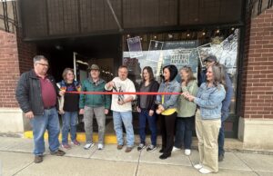 Record Arsenal spins its doors open in Ravenna The Ravenna Area Chamber of Commerce officially welcomed Record Arsenal, a new vintage vinyl record store, into Ravenna with a ribbon-cutting ceremony last Friday afternoon./Photo by Daniel Sherriff