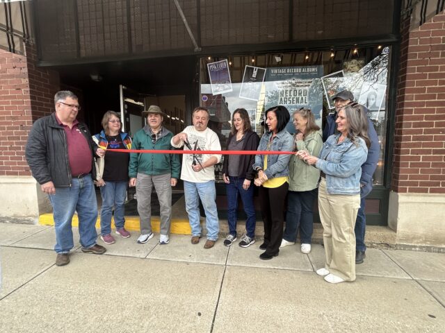 The Ravenna Area Chamber of Commerce officially welcomed Record Arsenal, a new vintage vinyl record store, into Ravenna with a ribbon-cutting ceremony last Friday afternoon./Photo by Daniel Sherriff