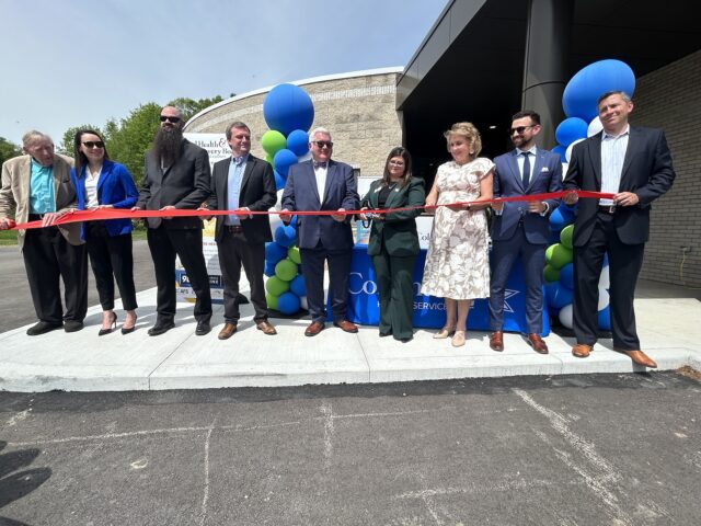 Coleman Health Services commemorated the arrival of the Portage Crisis Center with a ribbon-cutting ceremony last Tuesday morning at 3922 Lovers Lane in Ravenna/Photo by Daniel Sherriff