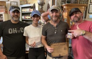 Final Clue Leads to Treasure Hunt End Pictured are Treasure Hunt mastermind Tom Colisimo, Treasure winners Jennifer & Trevor Debth and Sarchione Cheverolet’s Paul McEwen