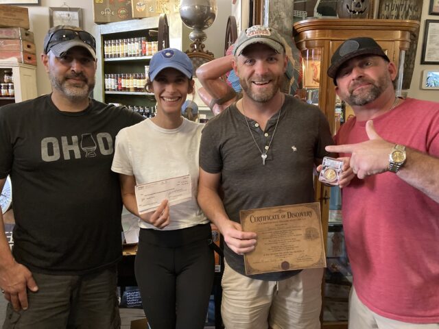 Pictured are Treasure Hunt mastermind Tom Colisimo, Treasure winners Jennifer & Trevor Debth and Sarchione Cheverolet’s Paul McEwen