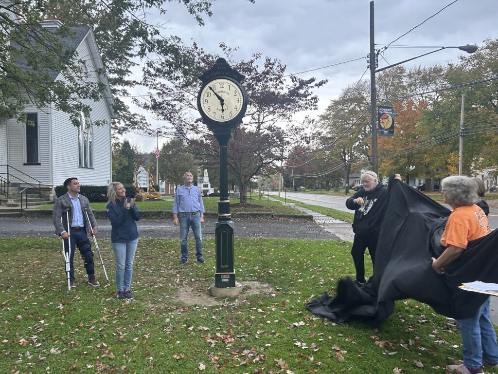 The Windham Historical Society officially unveils the new street clock on the Township green - Photo by Daniel Sherriff