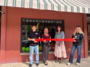 Ruoff Mortgage opens new branch in Ravenna Ruoff Mortgage Senior Loan Officer Tara Jenior (second from right) proudly cuts the ribbon to commemorate the grand opening of Ruoff Mortagage's Ravenna Branch alongside her children Kolten (far left), Koralee (far right) and Ravenna Mayoral Candidate Cherly Wood (second from left) - Photo courtesy of Tara Jenior